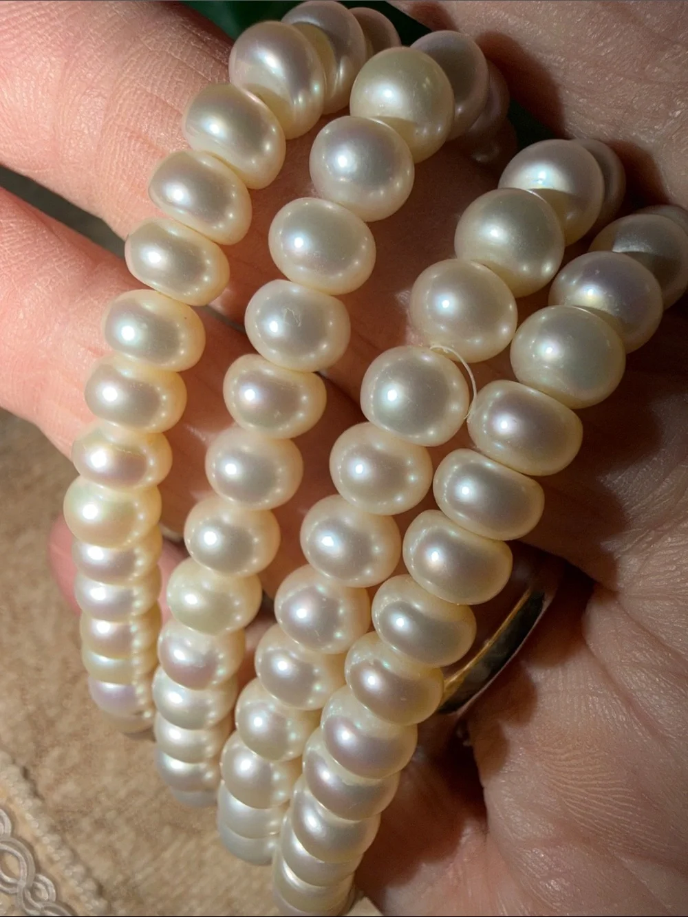 Set of four creamy pearls button style STRECH bracelets